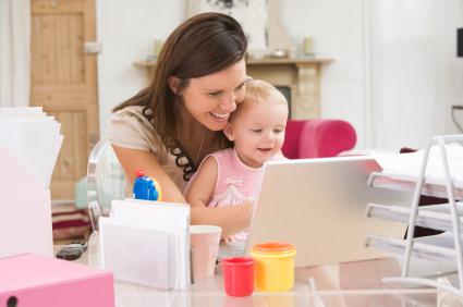 busy mom in office with kid